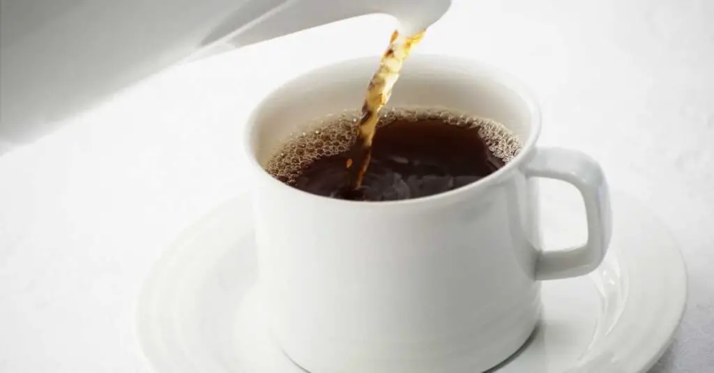 Can black tea cause stomach pain
