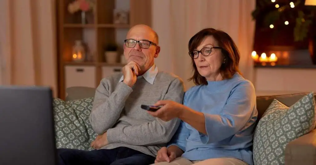 Can you wear reading glasses to watch TV